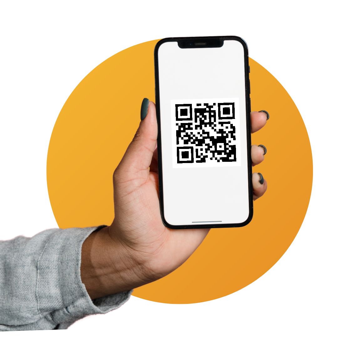 Person holding up QR Code on phone 